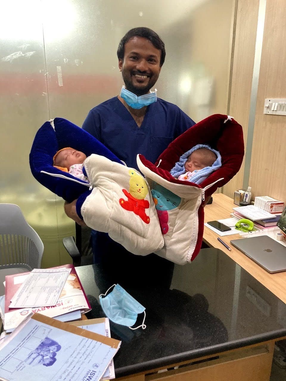 Happy couple with baby after successful IVF treatment by Dr. Arun Muthuvel
