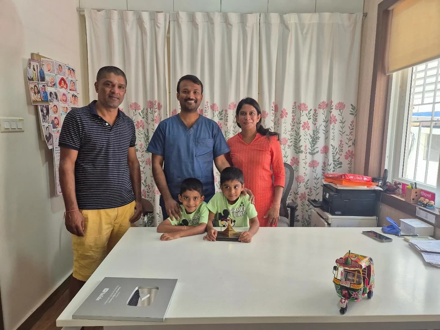Family with twin boys visiting Dr. Arun Muthuvel after successful IVF treatment in Chennai